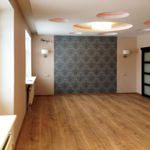 Фото ремонта спальни с круглыми вырезами в потолке
