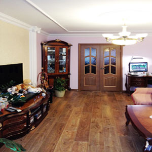 Фотография отремонтированной гостиной комнаты 